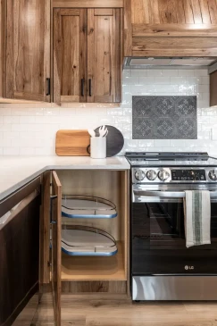 Smart corner cabinet storage solution in RTM home kitchen with custom wood cabinetry in Alberta and Saskatchewan